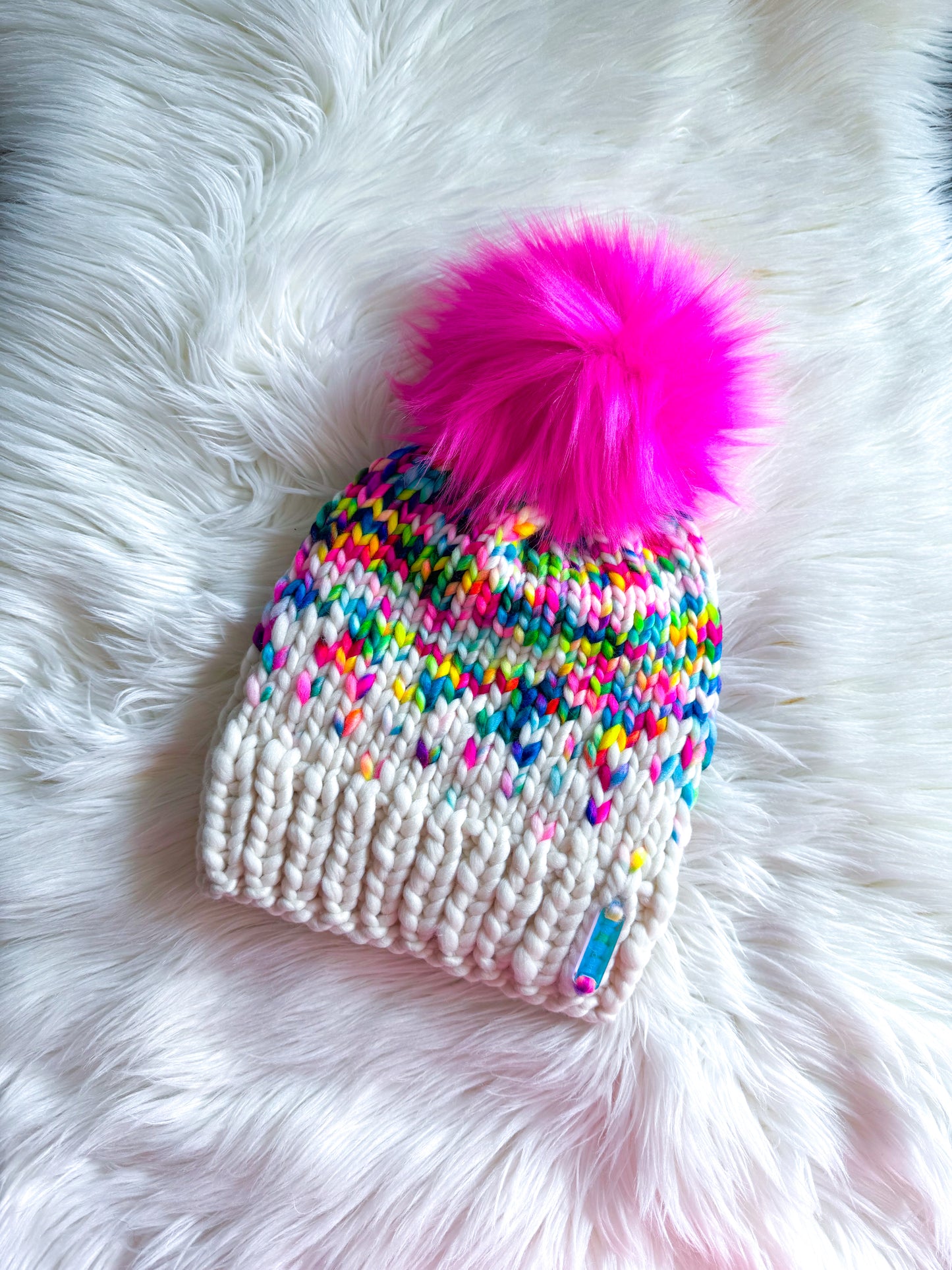 Rainbow Sprinkle Beanie – Merino Wool with Hot Pink Pom
