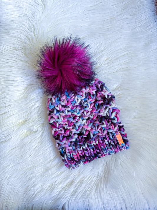 Berry Blast Beanie – Hand-Knit Merino Wool Hat with Faux Fur Pom
