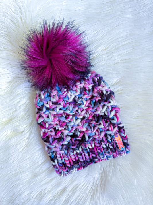 Berry Blast Beanie – Hand-Knit Merino Wool Hat with Faux Fur Pom