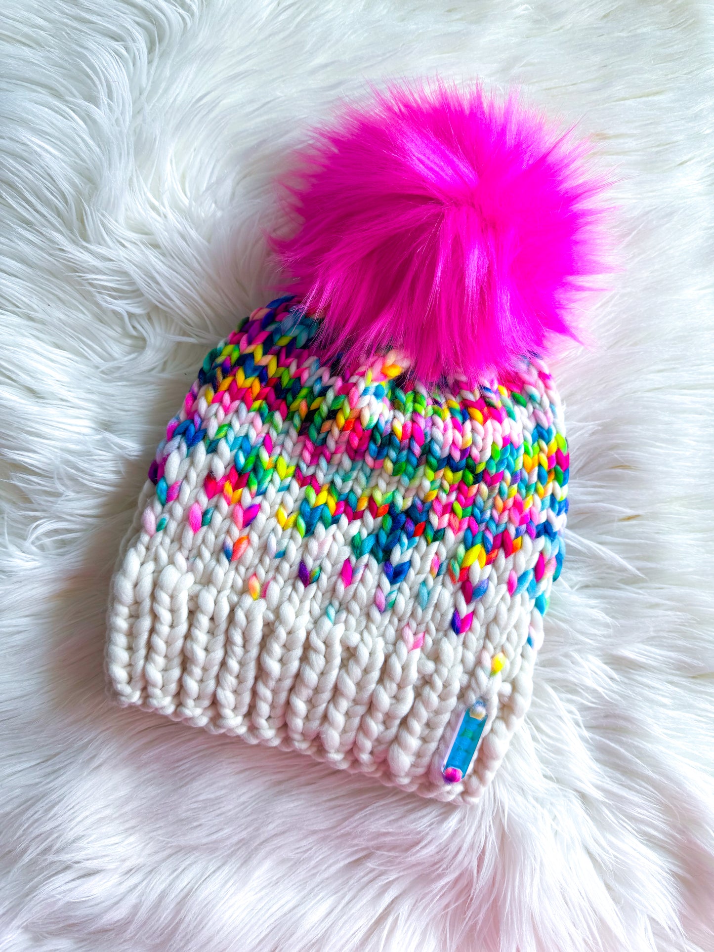 Rainbow Sprinkle Beanie – Merino Wool with Hot Pink Pom